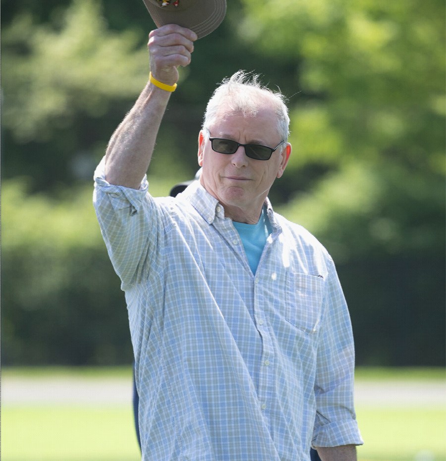 A veteran waving to the crowd